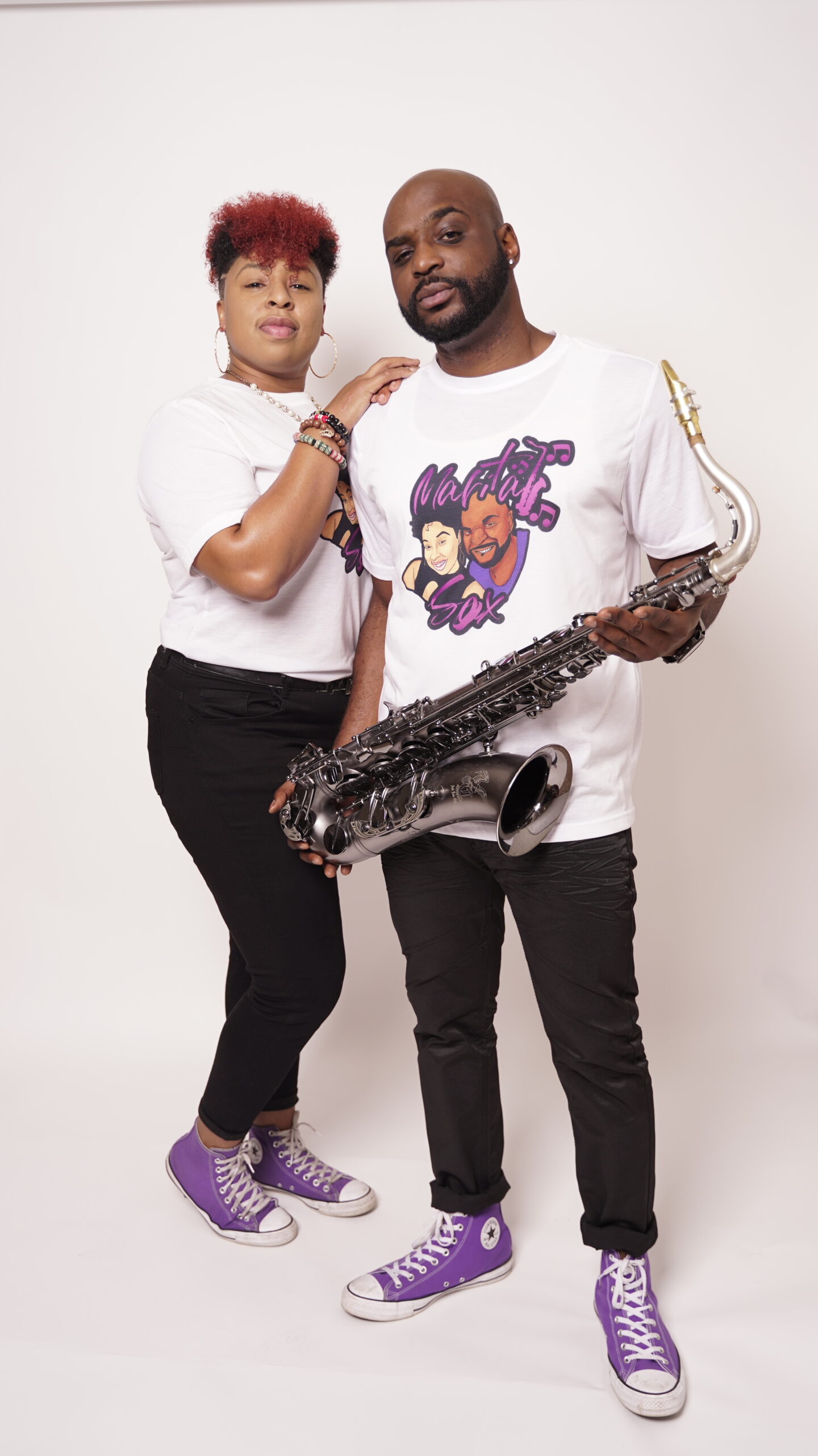 MaritalSax duo in branded merch with saxophones — Chicago live music by McKinney Music LLC.jpg